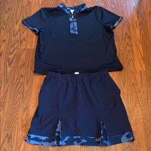 Chico’s matching navy blue camouflage skort and polo.